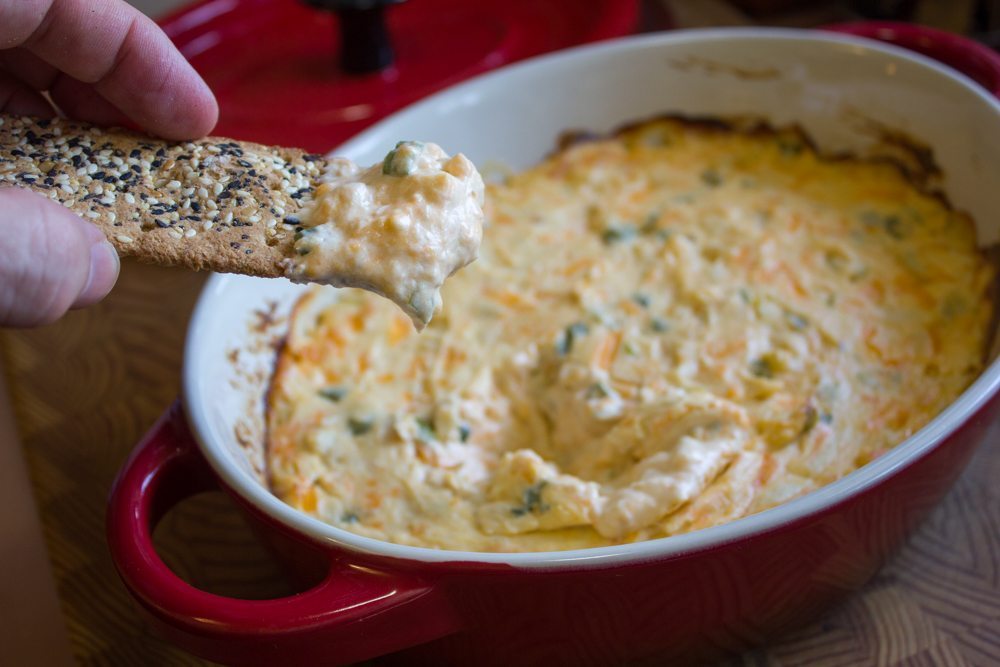 Bowl of smoked chicken dip with cracker