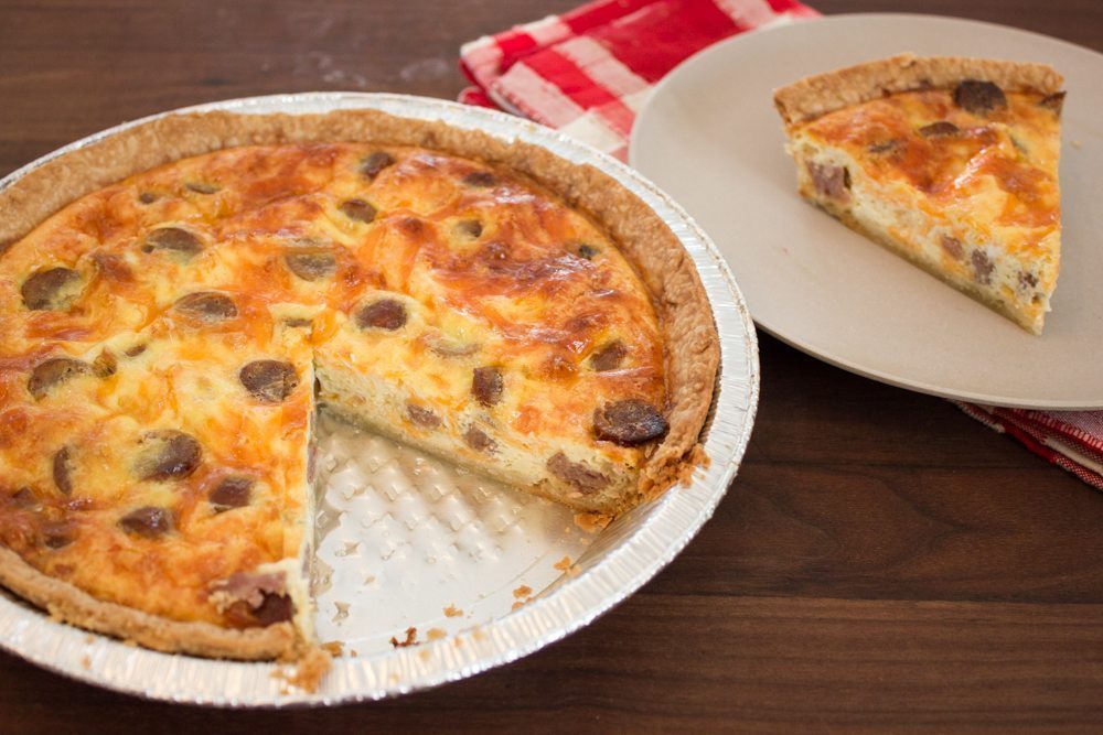 Pie plate of sausage and cheese quiche